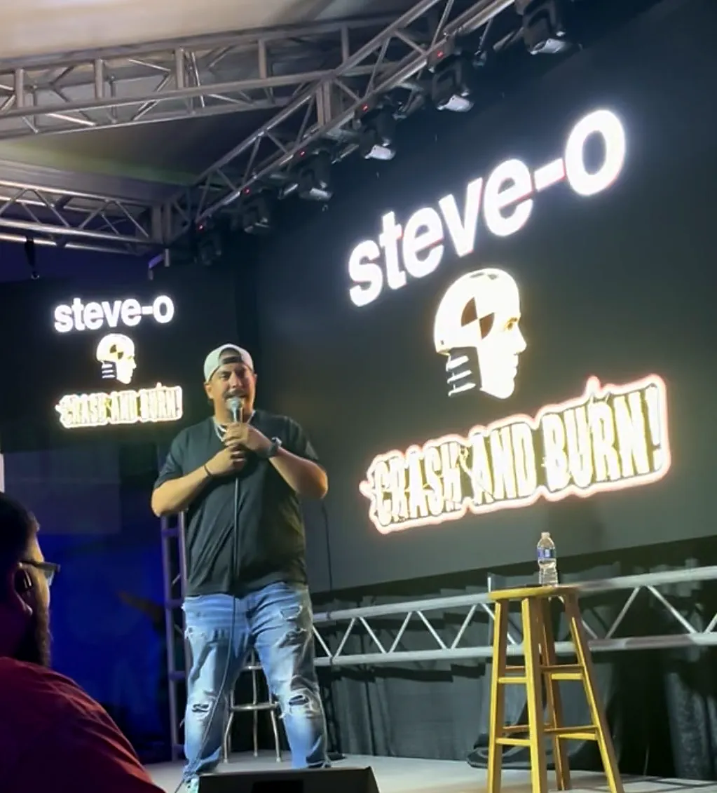 Chris with the mic on the Steve-O Crash and Burn stage