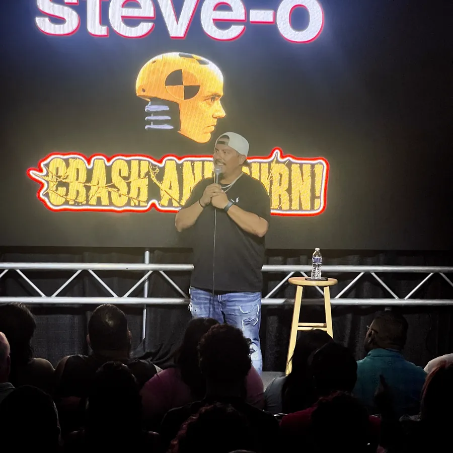 Chris on stage in front of the Steve-O Crash and Burn screen